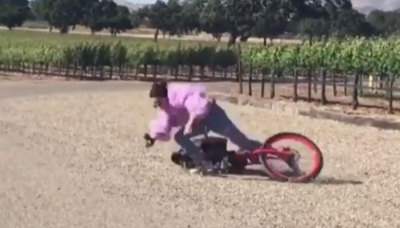 Watch: Kendall Jenner falls off bike | Newshub