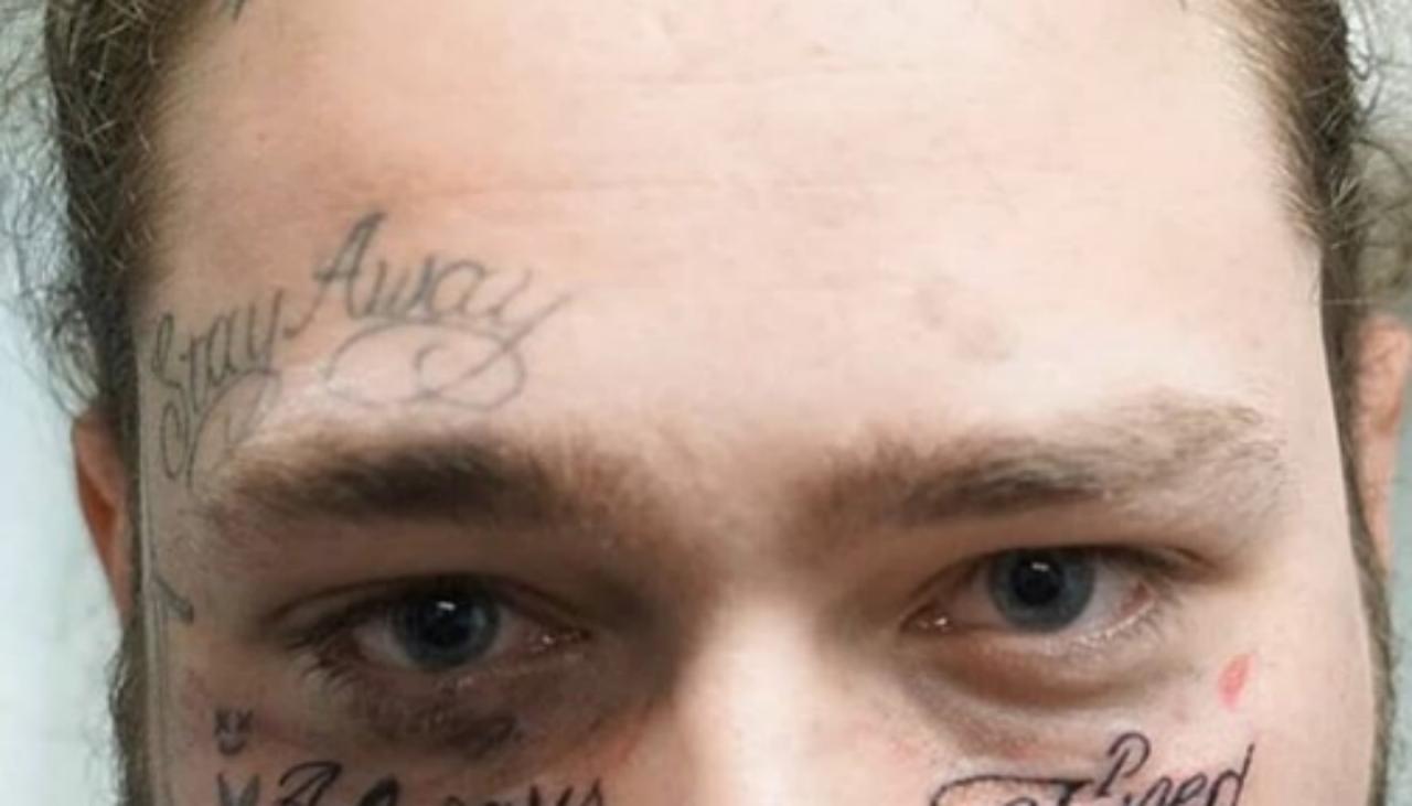 Prepare to cringe at Post Malone's new face tattoos | Newshub