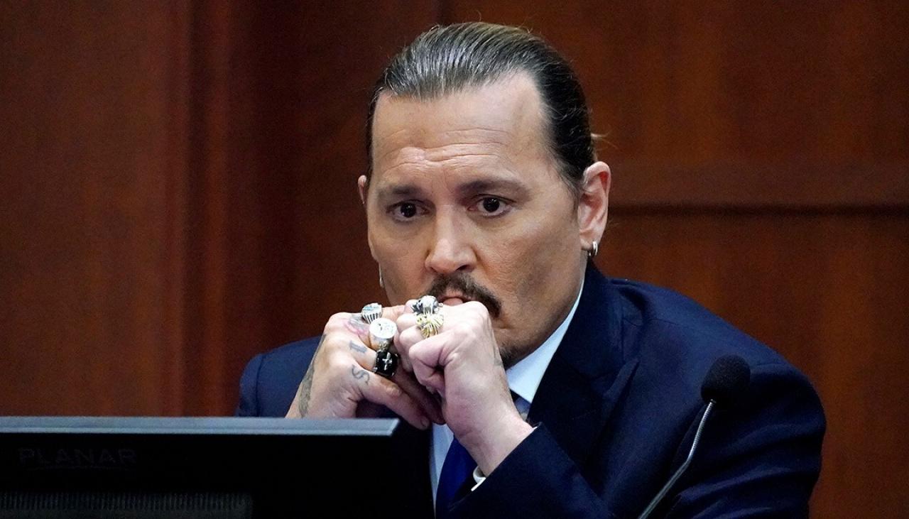 Court shown video of actor Johnny Depp slamming cabinets in Amber Heard
