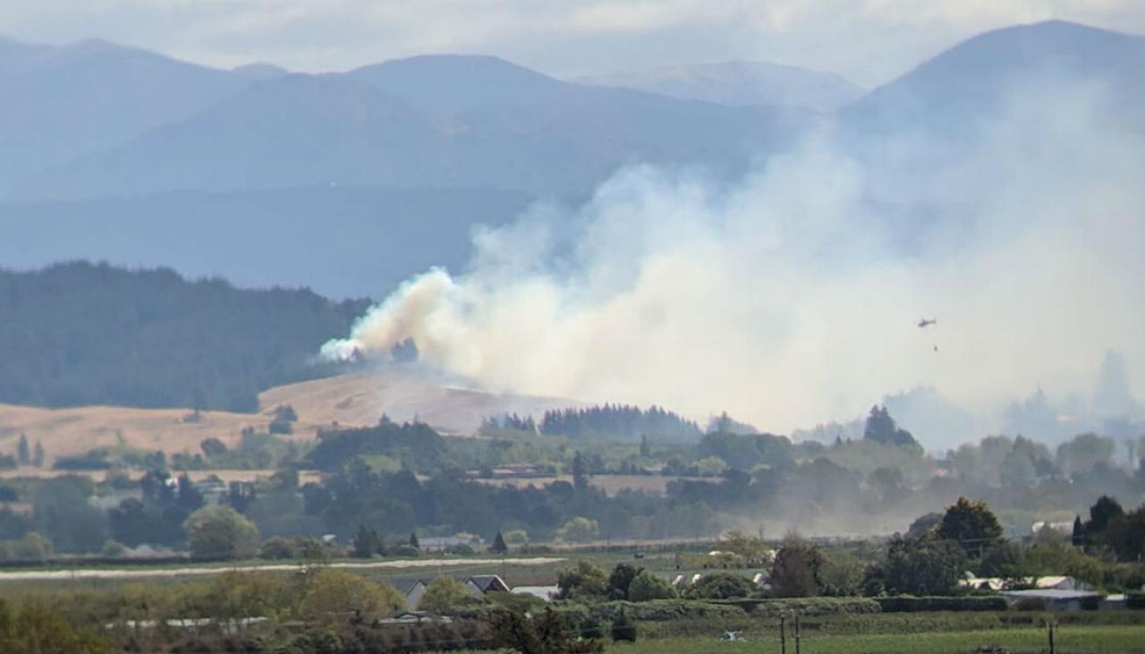 to warning travel china contained Tasman New fire Moutere, 'basically forest