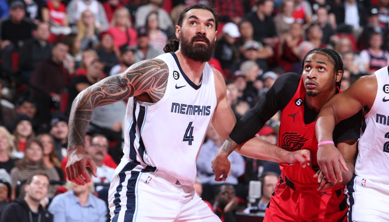Memphis Grizzlies center Steven Adams, right, dribbles around Portland  Trail Blazers center Jusuf Nurkic during the first half of an NBA  basketball game in Portland, Ore., Wednesday, Dec. 15, 2021. (AP Photo/Craig