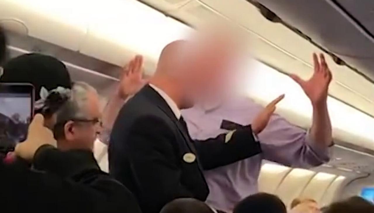 Irate Passenger Kicked Off Flight After Failed Handshake Attempt Newshub